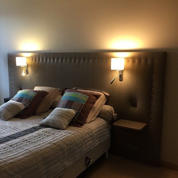 Tête de lit capitonnée sur mesure
